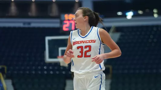 Natalie Pasco jogging back on defense
