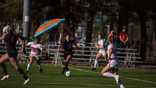 Morgan Padour running towards the ball.