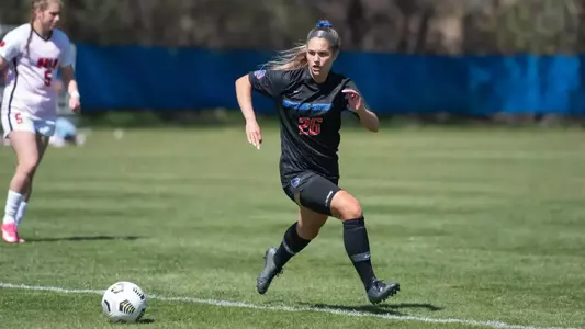 Morgan Padour running towards the ball.