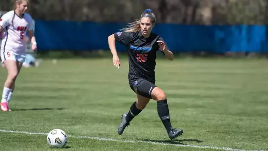 Morgan Padour running towards the ball.