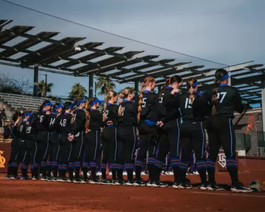 2024 Boise State softball team lined up for pregame against Northwestern, Feb. 9.