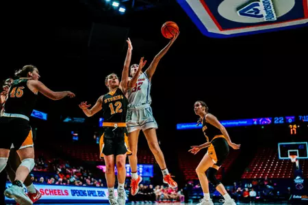 Natalie Pasco attempts a layup against Wyoming.