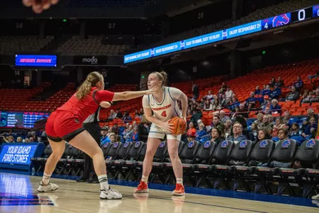 Dani Bayes squares up her defender