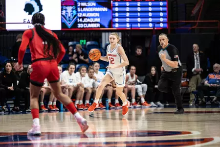 Mary Kay Naro dribbles up the floor.