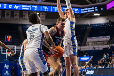 Cam Martin trying to get past defenders.