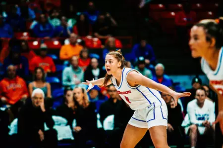 Mya Hansen playing defense against Utah State