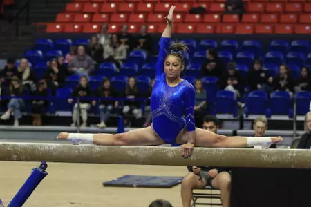 Emily Lopez competing on beam, 2024.