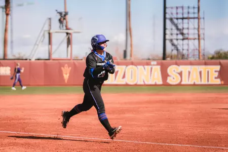 Brooklynn Pettis trots between third base and home plate after homering against Northwestern, Feb. 9, 2024
