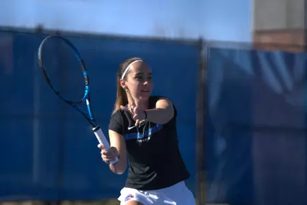 Nicole Discenza chasing down a ball at a home match against San Diego State