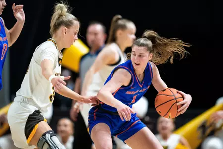 Mya Hansen posts up against Wyoming.