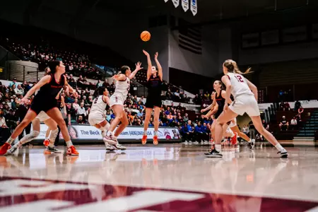 Natalie Pasco attempts a shot against Montana.