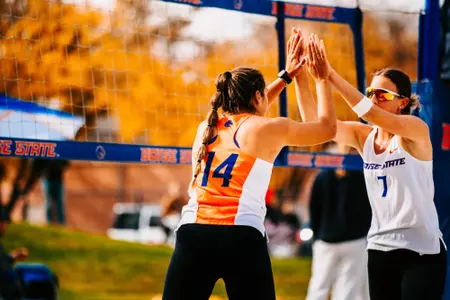 Marlayna Bullington and Sierra Land celebrate a point at the City of Trees Classic.