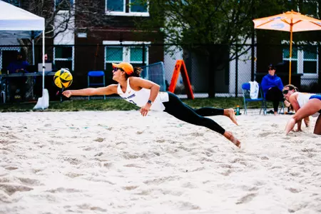 Emilia Guerra-Acuna dives for a ball at the Boise State Beach Classic.