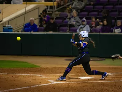 Alycia Flores swings at a pitch at LSU.