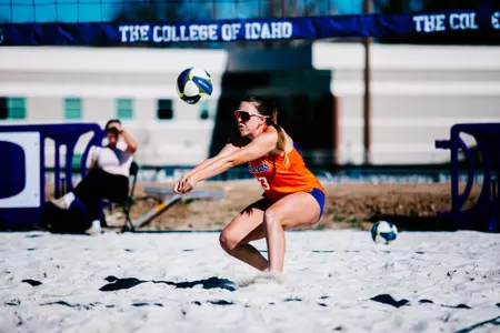 Aris Vetter digs a ball at the College of Idaho Classic.