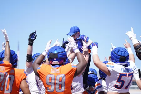 Broncos Team IMPACT signee Weston Derrick scores a touchdown on a two-yard run to start the 2024 Boise State Spring Game presented by First Federal.