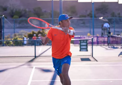 John Chin returns a shot against Air Force during the opening round of the Mountain West Championship.