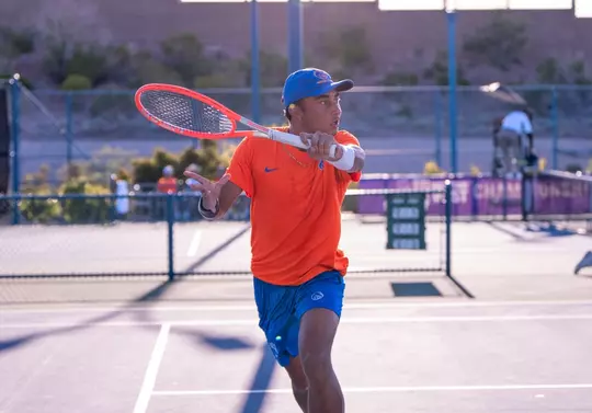 John Chin returns a shot against Air Force during the opening round of the Mountain West Championship.