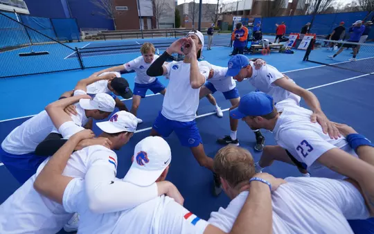Pre-match group huddle before the San Diego State match, March 29, 2024