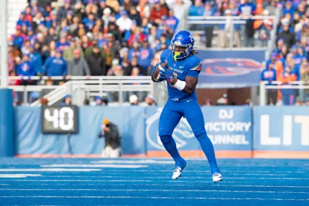 Football player running with ball