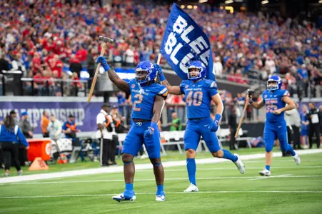 Football player holding flag