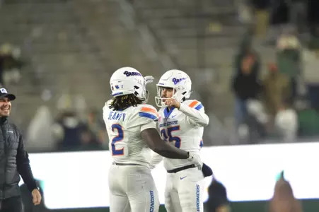 Ashton Jeanty and Jonah Dalmas embrace before Colorado State game