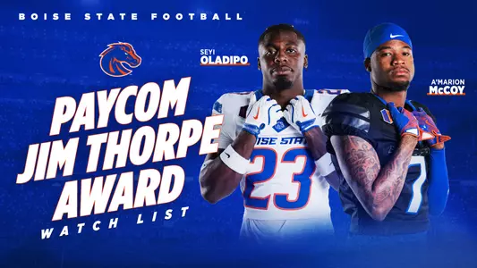 Paycom Jim Thorpe Award Watch List: Seyi Oladipo and A'Marion McCoy with hands resting inside shoulder pads