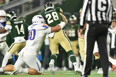 Braxton Fely, Boise State defensive tackle, makes a tackle at Colorado State in 2023.