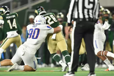 Braxton Fely, Boise State defensive tackle, makes a tackle at Colorado State in 2023.