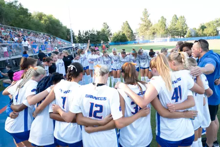 Boise State women's soccer team huddle.