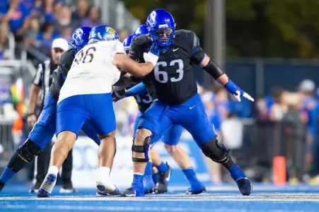 Mason Randolph blocking a San Jose State defensive lineman on The Blue