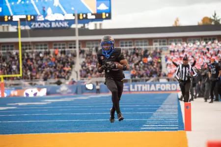 Latrell Caples scoring a touchdown on The Blue