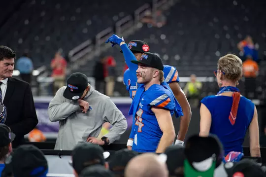 Alexander Teubner points to interim head coach Spencer Danielson following the MW Championship.