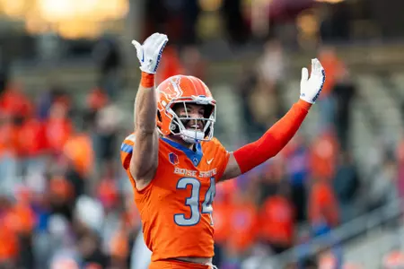 Boise State safety Alexander Teubner pumps up the crowd