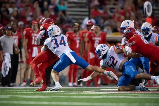 Alexander Teubner makes a tackle against New Mexico (9-9-22)