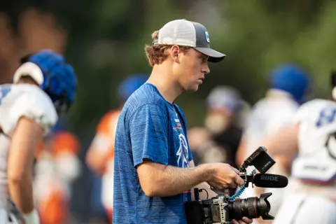 A look at some of the football support staff members working during a fall camp practice. Photo by Kenna Harbison