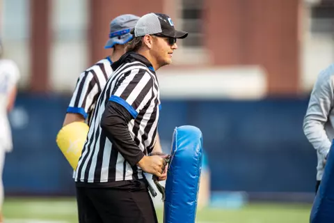 A look at some of the football support staff members working during a fall camp practice. Photo by Kenna Harbison