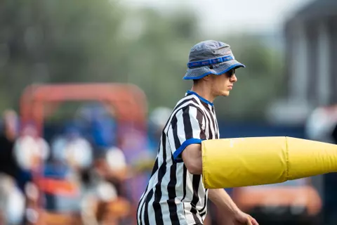 A look at some of the football support staff members working during a fall camp practice. Photo by Kenna Harbison