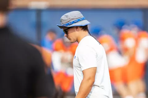 A look at some of the football support staff members working during a fall camp practice. Photo by Kenna Harbison