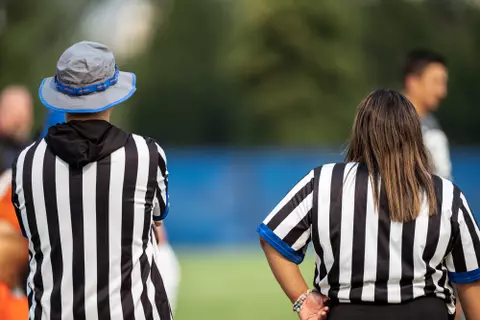 A look at some of the football support staff members working during a fall camp practice. Photo by Kenna Harbison