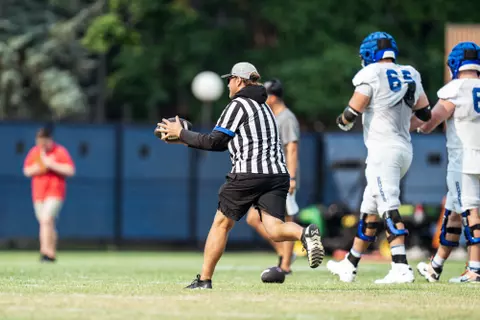 A look at some of the football support staff members working during a fall camp practice. Photo by Kenna Harbison