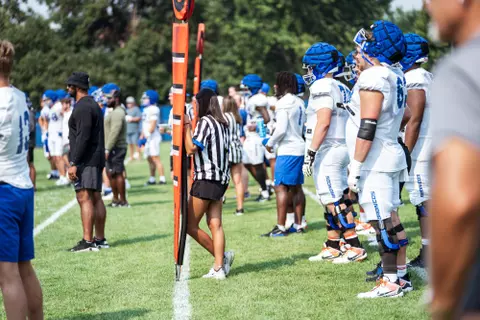 A look at some of the football support staff members working during a fall camp practice. Photo by Kenna Harbison