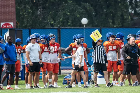 A look at some of the football support staff members working during a fall camp practice. Photo by Kenna Harbison