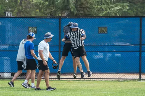 A look at some of the football support staff members working during a fall camp practice. Photo by Kenna Harbison