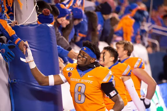 Markel Reed greeting fans after a win
