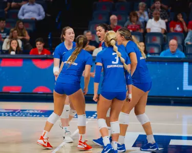 Huddle shot with the Broncos on court after a point at Arizona on August 30, 2024.