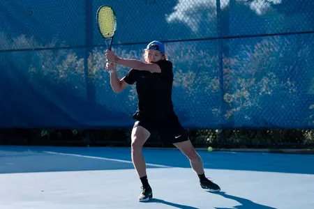 Adam Duda returns a volley during the Dar Walters Classic in September of 2024.