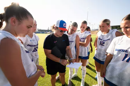 Boise State soccer huddle around Liz Ruiz.