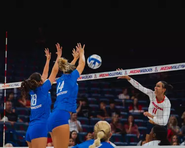 Annie Kaminski and Anabel Kotzakov block a shot at Arizona on August 30, 2024.