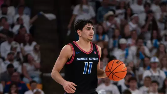 Alvaro Cardenas brings the ball up the floor against Utah State
